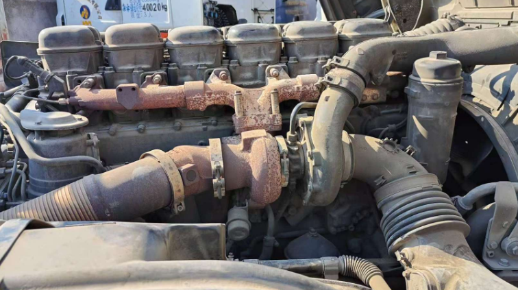 Detailed close-up of original DC13 engine from Scania G410 tractor truck.