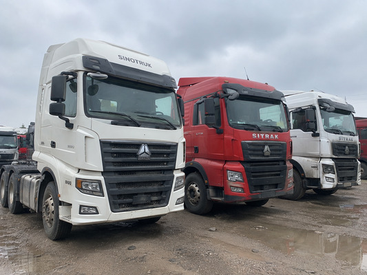 Used Sinotruk and SITRAK tractors in a heavy-truck yard