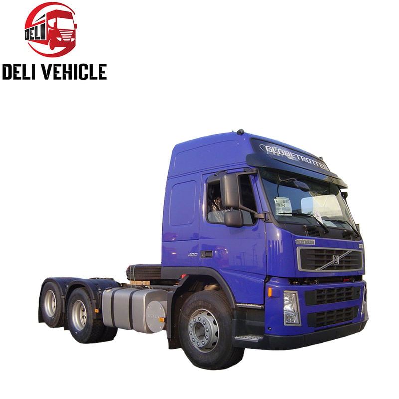 Used Volvo FM FH Series 6x2 diesel tractor truck for sale, 400-500HP good condition blue cab heavy duty truck head, left front side view