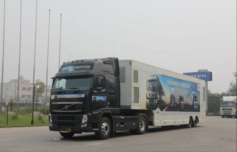 Low price vol vo tractor truck for sale used volvo FH440 4X2 trailer truck head, 440HP heavy duty tractor hauling container trailer, left side view road scene
