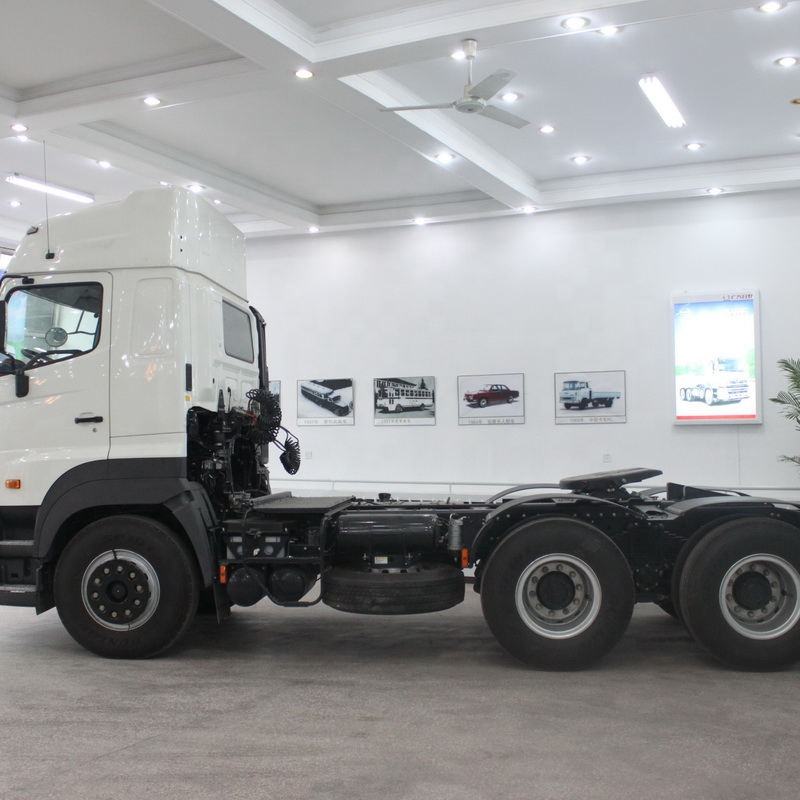 Left front side view of second hand Hino 700 Series 350HP heavy tractor truck, high roof cabin manual transmission, good condition used tractor