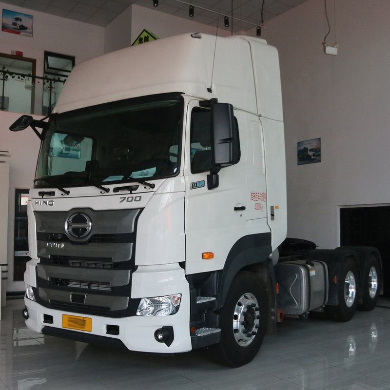 Left front side view of used Hino 700 Series 450HP heavy-duty dangerous goods transport tractor truck, best price second hand heavy tractor