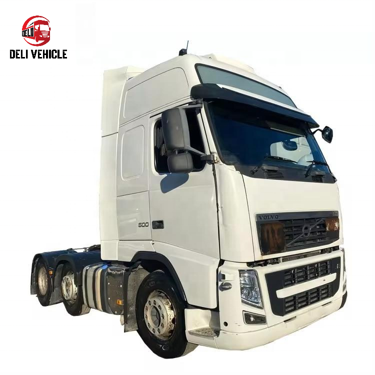 Left front side view of USED VOLVO FH500 6x2 Euro trailer truck, 500HP heavy duty used tractor truck with white cab