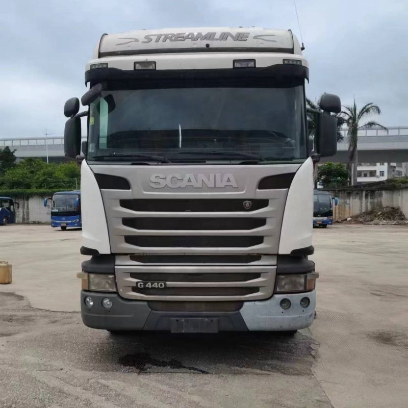 Best price used SCANIA G440 6x2 heavy cargo tow truck front face view, outdoor storage yard scene