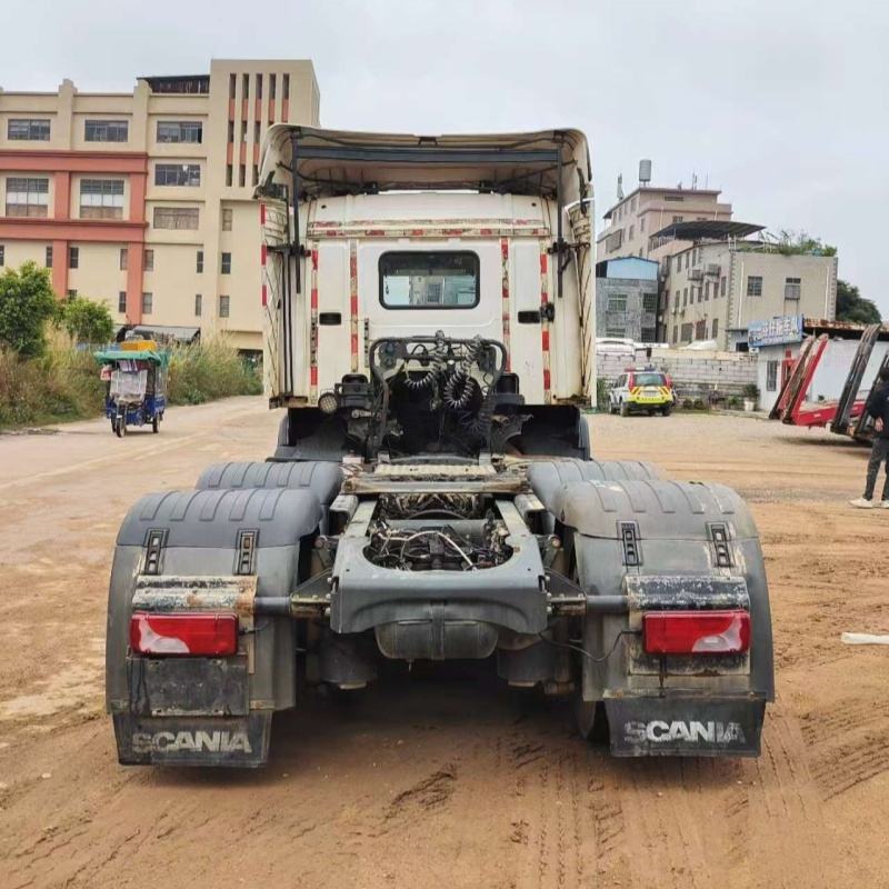 High quality used SCANIA P380 6x2 heavy duty tractor truck rear view, showing rear bumper, tail lights and fifth wheel coupling