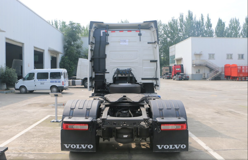 Used 6x2 FM460 for VOLVO tractor truck for sale good condition trailer truck head, 460HP heavy duty tractor showing fifth wheel and rear lights, rear view