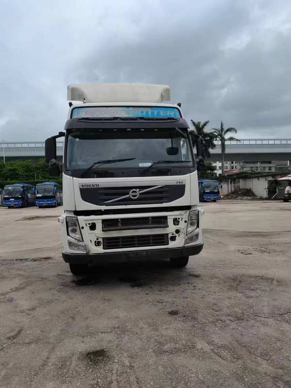 Good condition used Volvo FM FH Series 6x2 diesel tractor truck for sale, 400-500HP heavy duty truck head front face view, outdoor yard