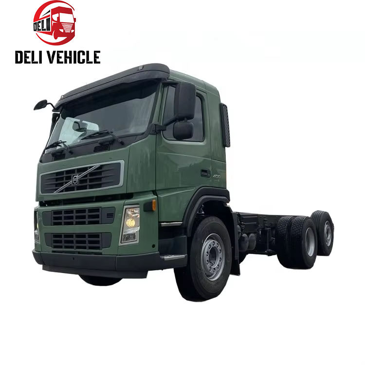 Left front side view of USED Euro trailer truck for VOLVO FM400 6x2 used tractor truck, 400HP heavy duty green tractor head