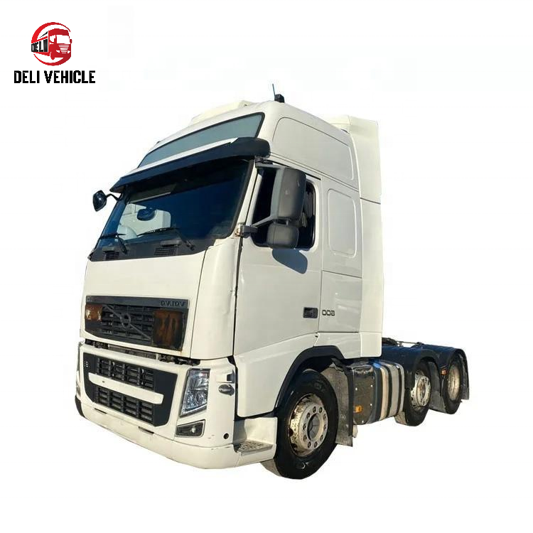 Left front angle view of USED Euro trailer truck for VOLVO FH500 6x2 used tractor truck, 500HP heavy duty white tractor head