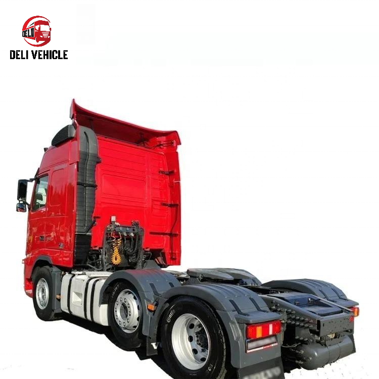 Left rear chassis view of second hand used trailer truck for VOLVO FH460 6x2 used tractor truck, 460HP heavy duty red tractor showing undercarriage