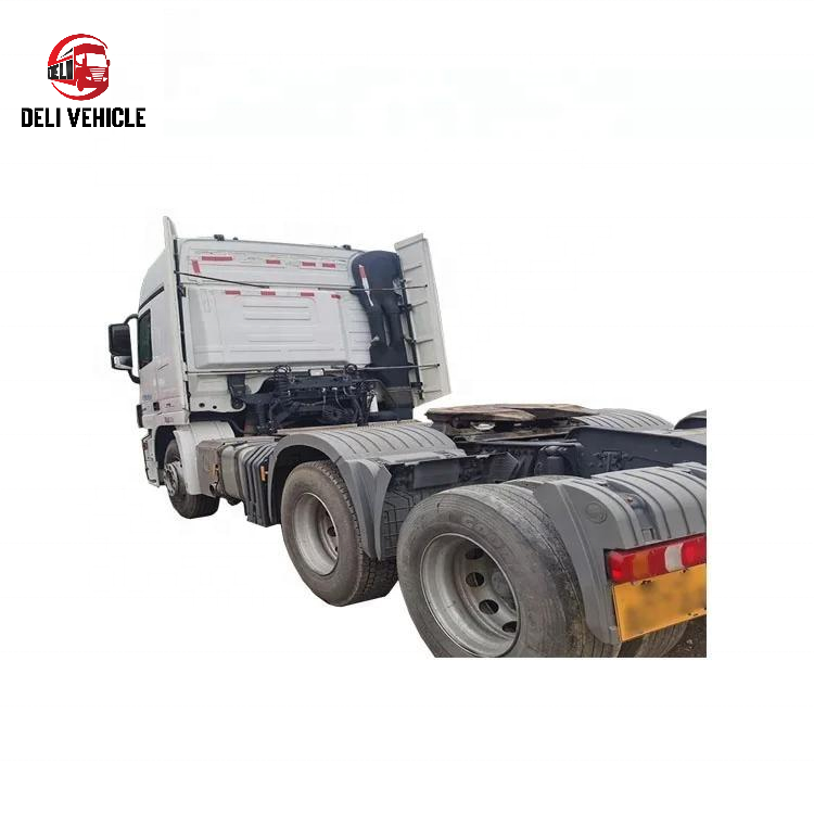 Full left side view of USED Mercedes 2644 6x2 Euro trailer truck, second hand heavy duty used tractor truck with white cab