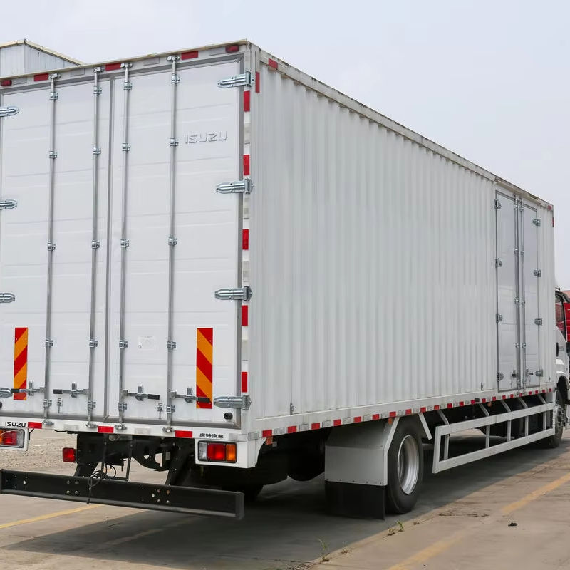 Full left side view of used Isuzu Giga 205HP 4x2 10 ton payload enclosed box van cargo truck, good condition for sale