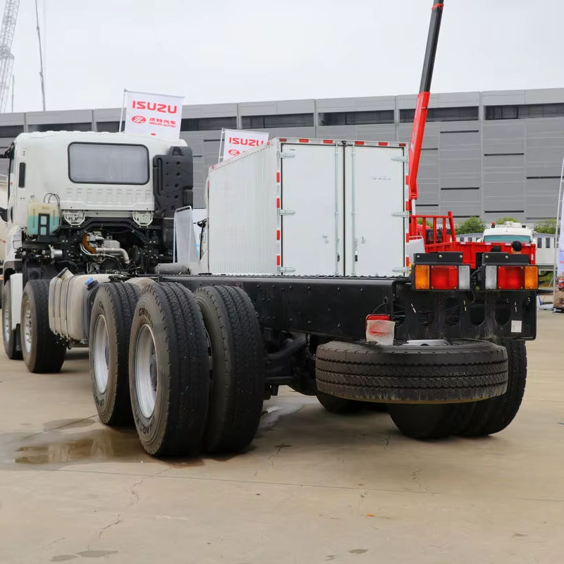Rear chassis view of used Isuzu Giga 520HP 8*4 heavy tractor, showing rear axles and frame of specialized operation vehicle