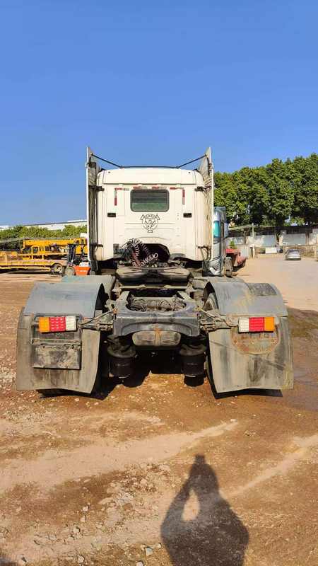 Used 6x2 for SCANIA G420 second-hand iron trailer truck semi-trailer truck for sale, 420HP heavy duty semi-tractor with brand front grille, front face view sunny outdoor scene