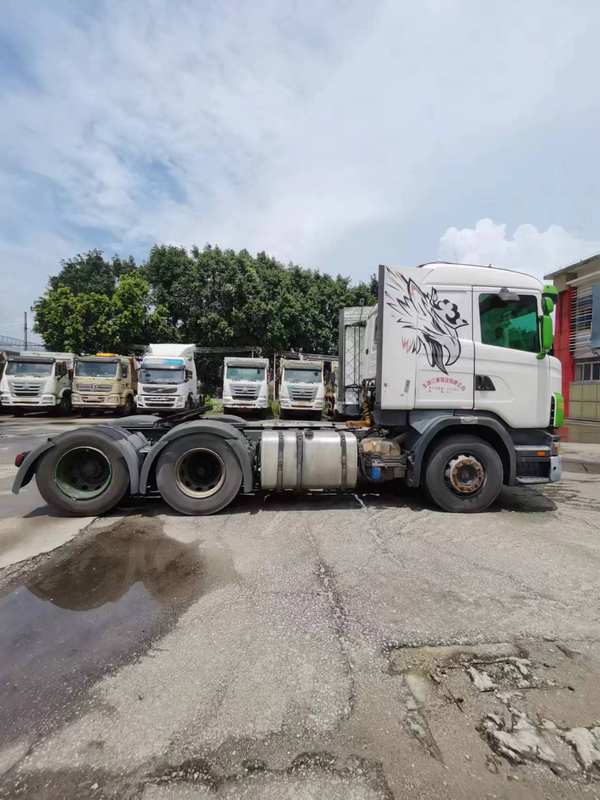 Factory direct used SCANIA G420 6x2 drive heavy tractor truck, full left side view showing chassis frame and rear axles
