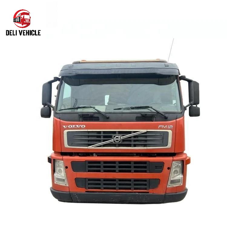 Front face view of good condition VOLVO FM420 6x2 used tractor truck, 420HP heavy duty used trailer truck with red cab and front grille