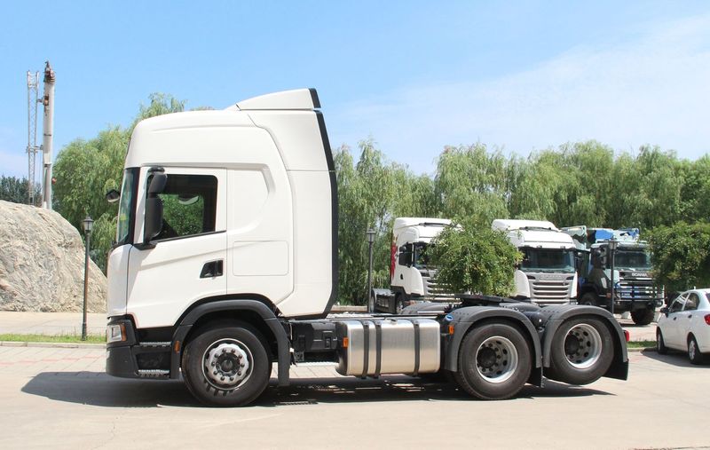Super performance used SCANIA G500 diesel heavy truck, full right side view outdoor roadside natural scene