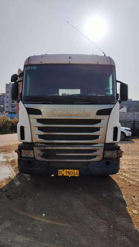 Used 6x2 for SCANIA G420 second-hand iron trailer truck semi-trailer truck for sale, 420HP heavy duty semi-tractor showing brand logo on grille, front close-up view shaded scene