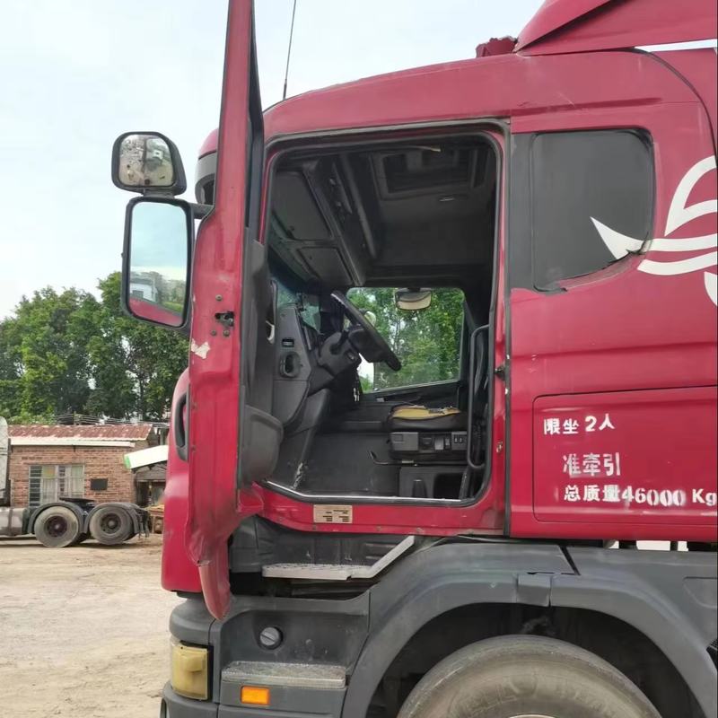 Used SCANIA G440 6x2 diesel tractor truck second hand trailer head for road transport, 440HP heavy duty diesel tractor showing driver cab door and side body, left side cab view