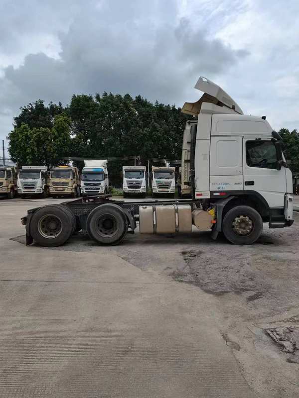 Left side view of good condition used Volvo FM FH Series 6x2 diesel tractor truck for sale, 400-500HP heavy duty truck head, outdoor parking lot