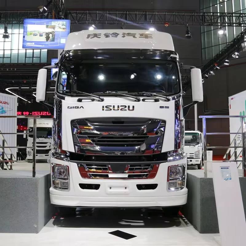 Right front side view of used Isuzu Giga VC46 VC61 VC66 4x2 Euro 5 heavy logistics tractor truck, good condition for sale at exhibition