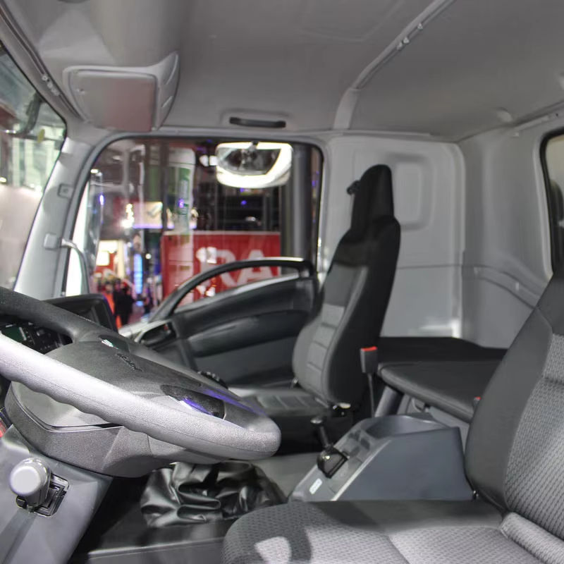 Interior view of Isuzu Giga truck cabin, second-hand 350HP 4*2 Euro5 left steering diesel van cargo truck for Qingling