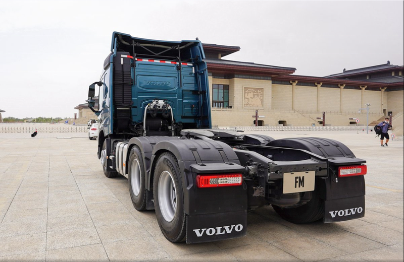Second hand VOLVO FM420 6X4 heavy cargo tow trucks 6X4 trailer head tractor head, 420HP heavy duty tractor showing rear wheels and heavy load tires, left side view