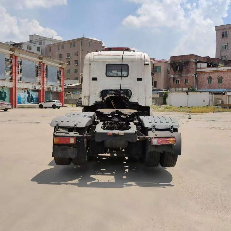 Used SCANIA G420 6x2 manual tractor truck rear view, showing rear bumper, tail lights and fifth wheel coupling