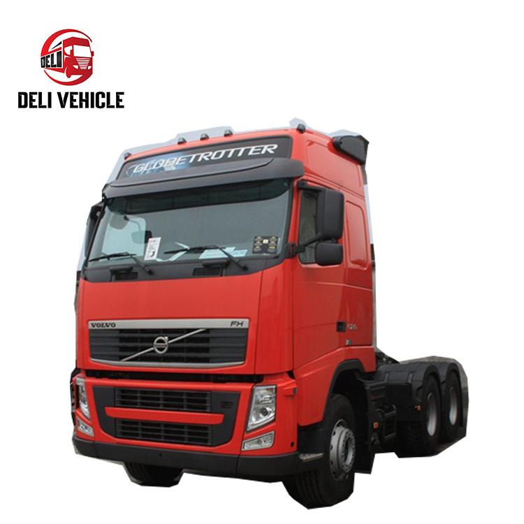 Right front side view of high quality Volvo FH520 6*2 used truck, 520HP second hand trailer with red cab heavy duty tractor head