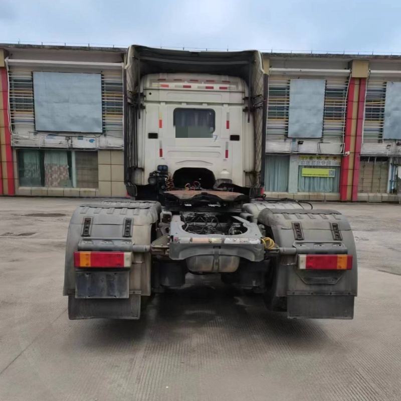 Used SCANIA G440 6x2 heavy cargo tow truck rear view, showing rear bumper, tail lights and fifth wheel coupling