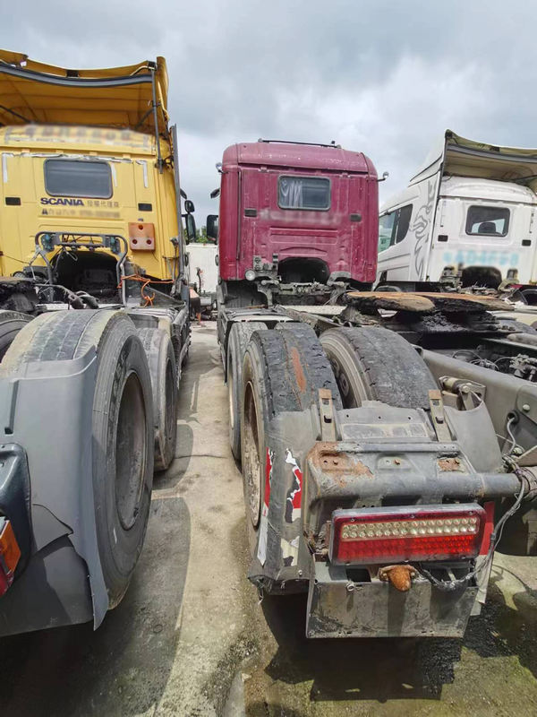 Scania commercial vehicle G series heavy truck 420hp 6x2 truck, 420HP heavy duty tractors showing rear bumpers and fifth wheel couplings, rear view with multiple units in stock