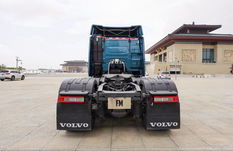 Second hand VOLVO FM420 6X4 heavy cargo tow trucks 6X4 trailer head tractor head, 420HP heavy duty tractor showing rear bumper and tail lights, rear view