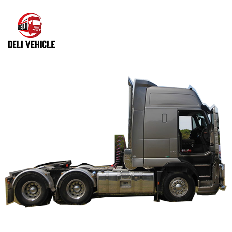 Full left side view of high quality used 6*2 truck for Volvo FH580 used truck second hand trailer, 580HP heavy duty silver grey tractor