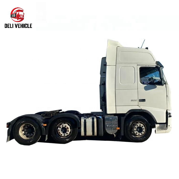Full left side view of USED Euro trailer truck for VOLVO FH500 6x2 used tractor truck, 500HP heavy duty white tractor head