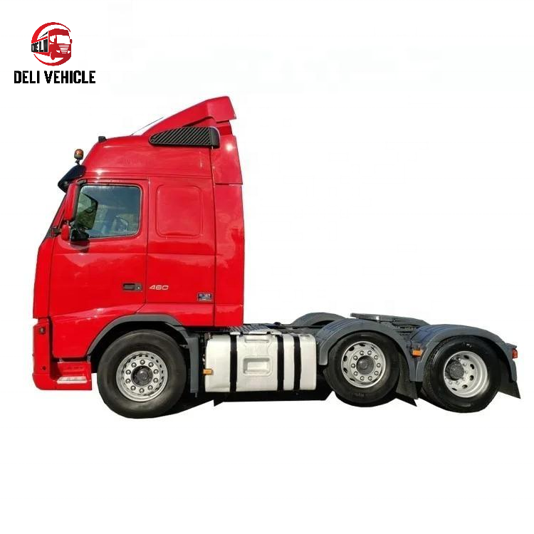 Full left side view of second hand used trailer truck for VOLVO FH460 6x2 used tractor truck, 460HP heavy duty red tractor head