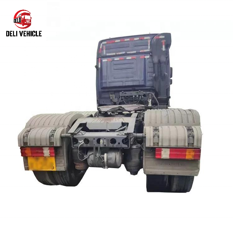 Rear view of USED Mercedes 2644 6x2 Euro trailer truck, second hand heavy duty used tractor truck showing rear lights and chassis