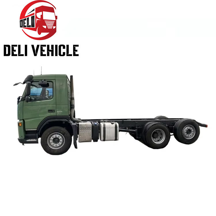Right side view of USED VOLVO FM400 6x2 Euro trailer truck, 400HP heavy duty used tractor truck with green cab