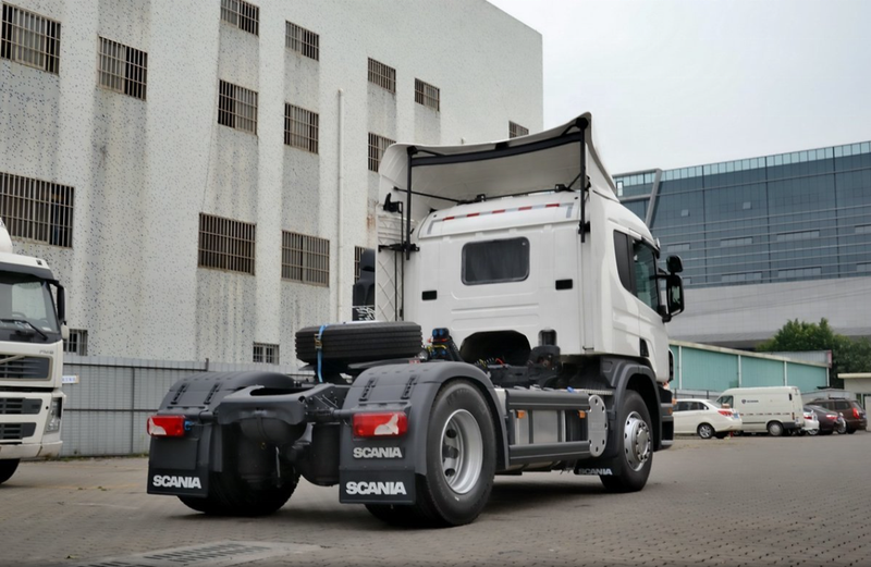 Low price truck tractor used trailer truck head SCANIA P360 4x2 tractor truck head, 360HP heavy duty white tractor, right rear side view outdoor factory scene