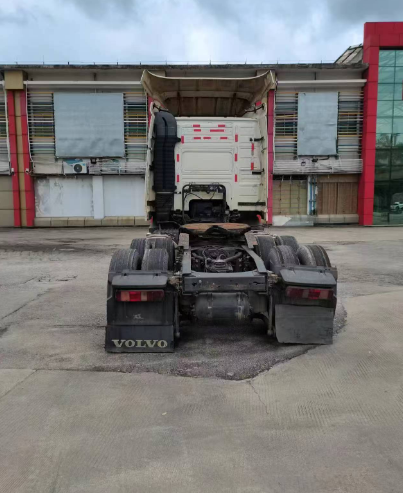Special prices second hand for VOLVO FM440 6x2 tractor truck adequate stock available, 440HP heavy duty tractor showing rear bumper and lights, rear view