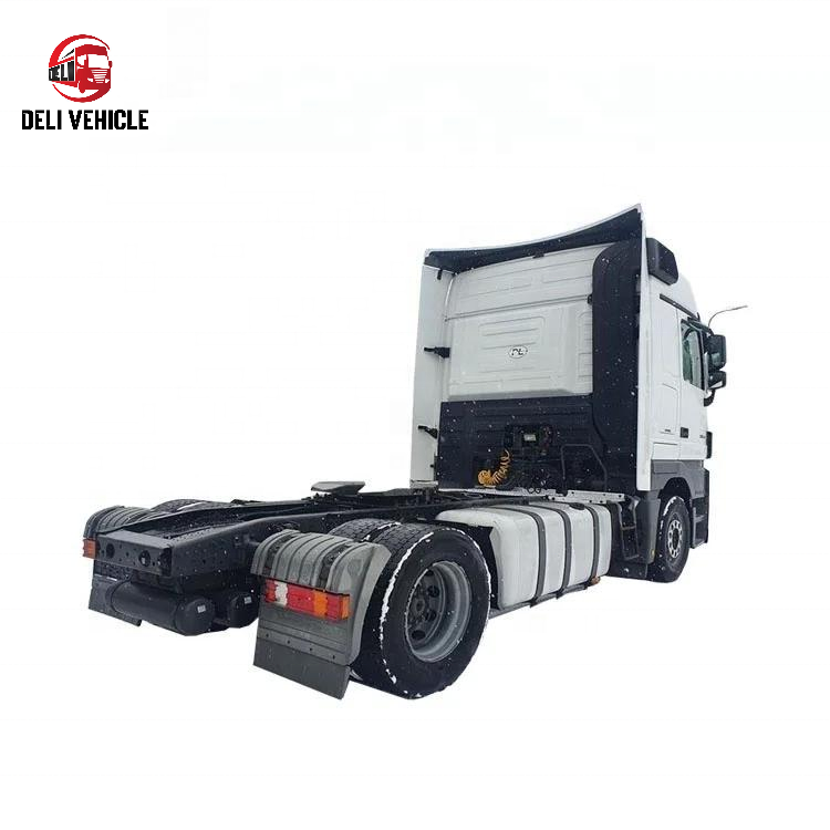 - Right rear side view of good condition Mercedes 1844 4X2 used truck, second hand heavy duty tractor head showing rear lights and chassis