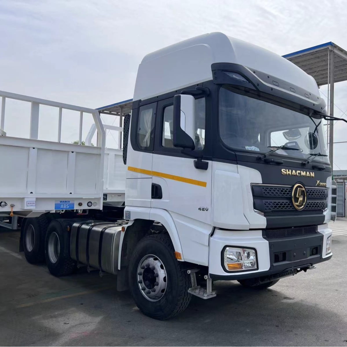 Front right side view of white used Shacman Delong X3000 6X4 Euro6 heavy duty tractor truck