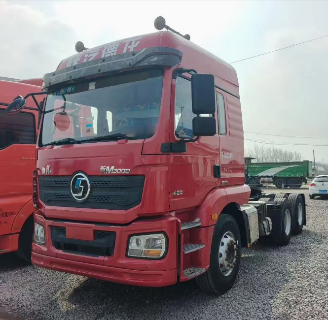 Front left side view of red used Shacman M3000 6×4 Euro 5 heavy duty tractor truck