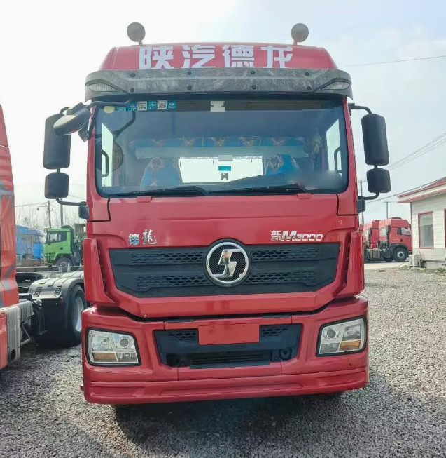 Front view of red used Shacman M3000 6×4 Euro 5 heavy duty tractor truck