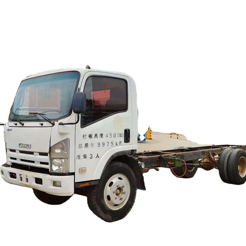 Front left view of white used Isuzu 700P 4x2 diesel light cargo chassis truck