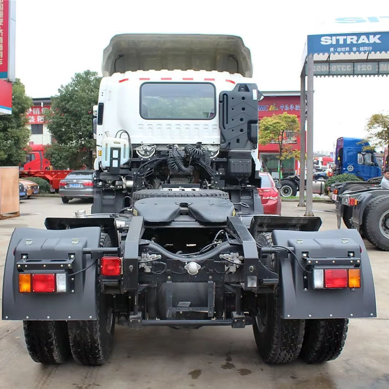 Rear chassis view of used Isuzu VC46 4x2 heavy duty tractor head, showing rear axles and frame, Euro 4 left steering