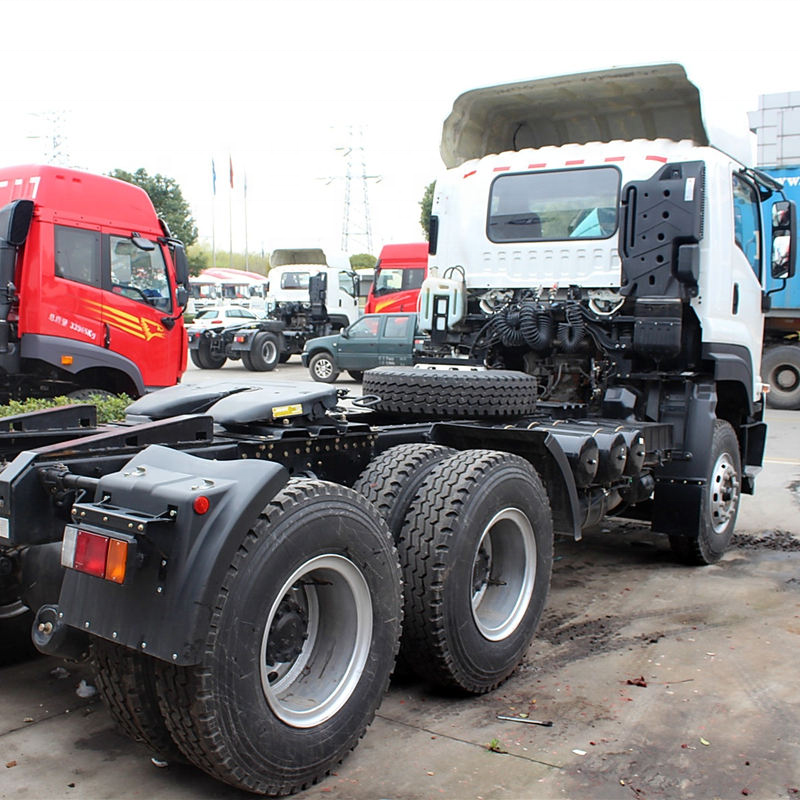 Rear chassis and axle side view of Isuzu VC46 6x4 heavy duty used tractor truck