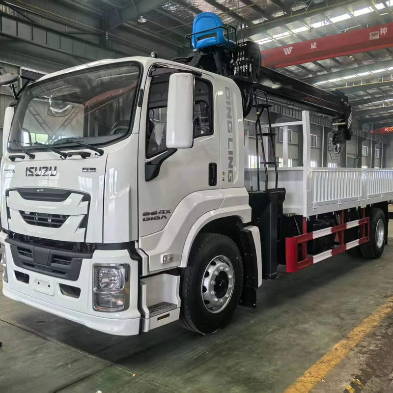 Left front side view of used Isuzu Giga 4x2 205hp manual transmission diesel cargo truck, indoor workshop scene
