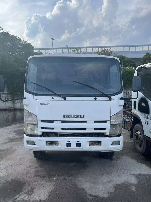 Front view of white used ISUZU 700P 4x2 diesel light cargo truck