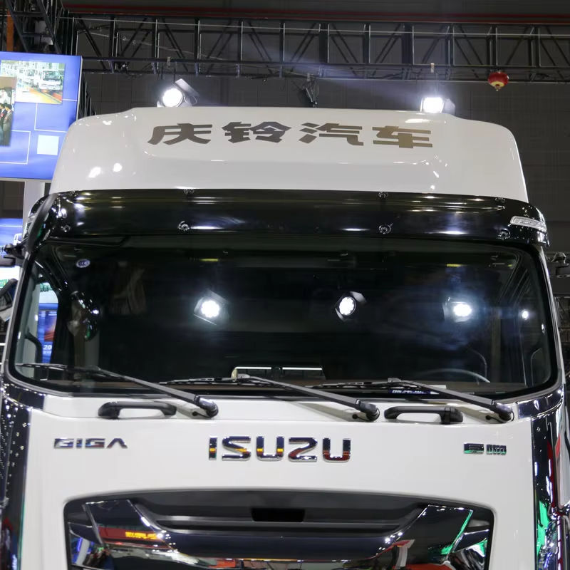 Close-up front view of Isuzu Giga Vc66 heavy tractor truck, showing windshield and front fascia, 520HP AMT Euro VI