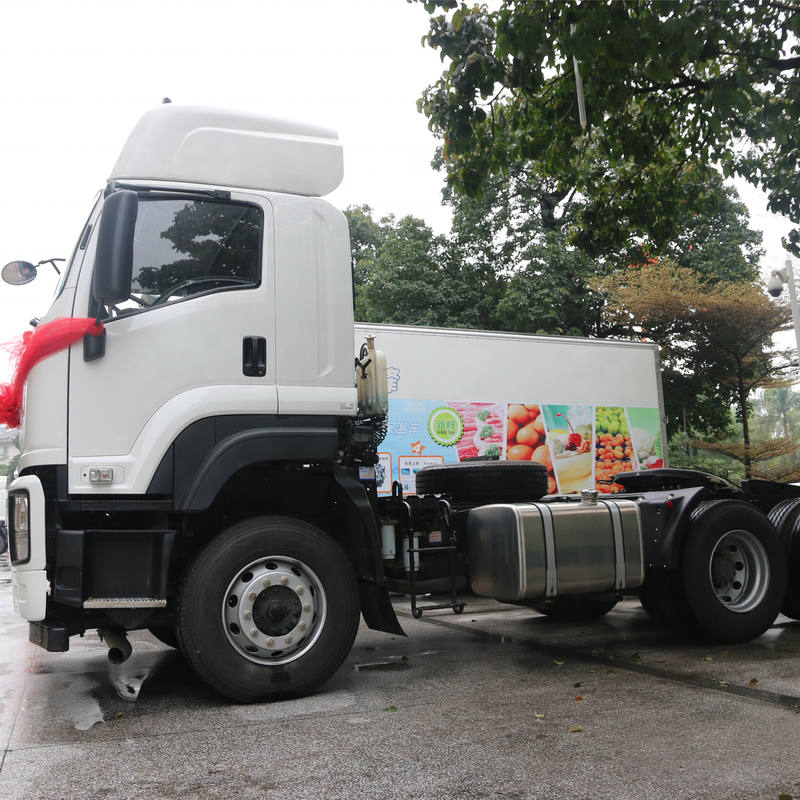 Full left side view of Isuzu VC46 6x4 350HP manual transmission high roof second hand tractor truck
